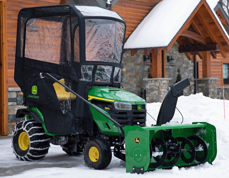 Snow equipment on a John Deere tractor
