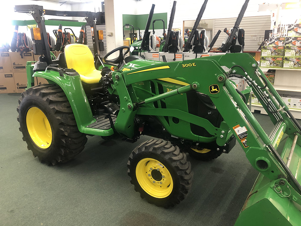 John Deere 3025E Compact Utility Tractor drivers side view John Deere 3025E Compact Tractor